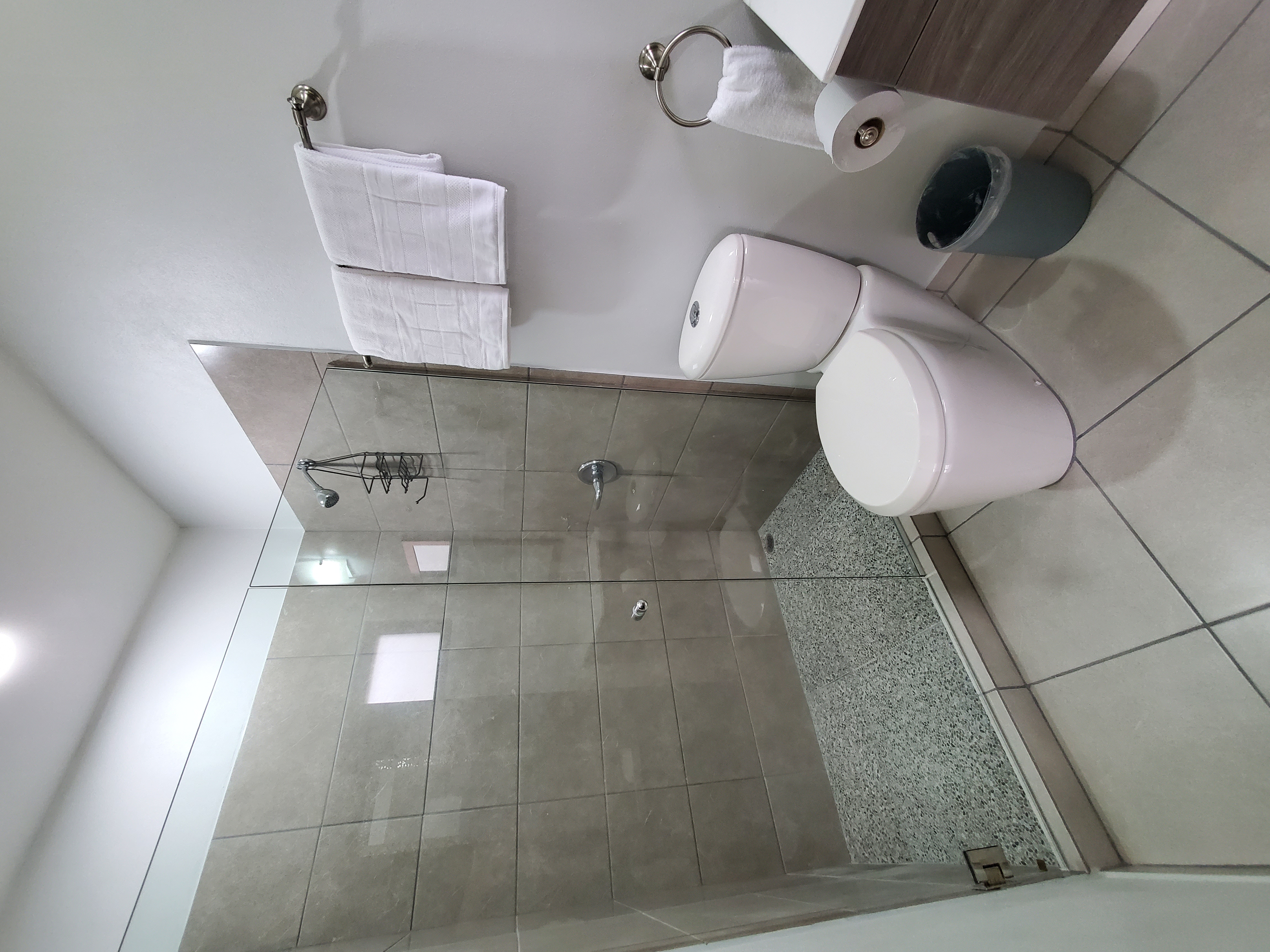 bathroom with glass shower in house for sale samara costa rica