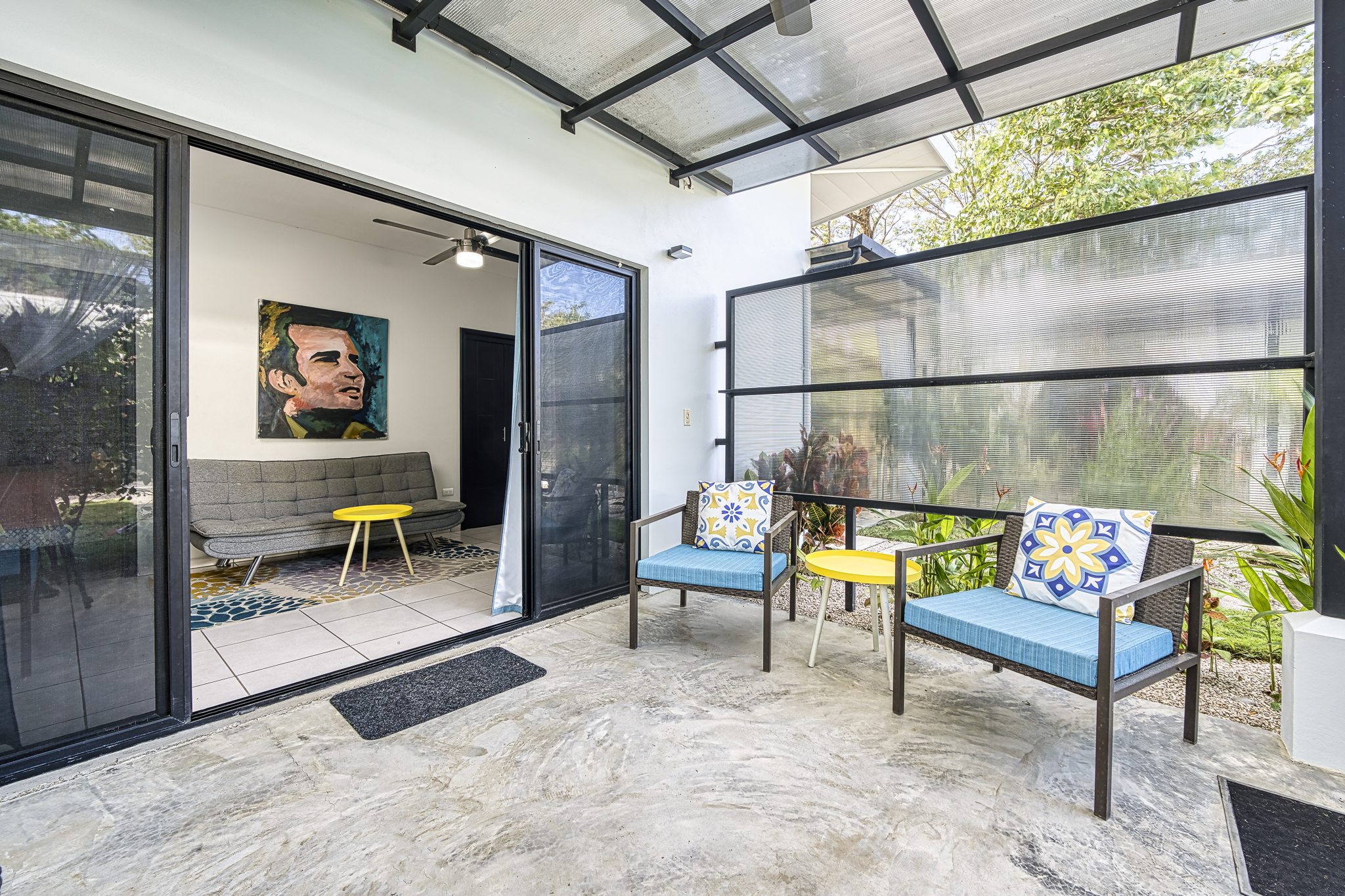 outdoor terrace lounge area in tropical property samara costa rica