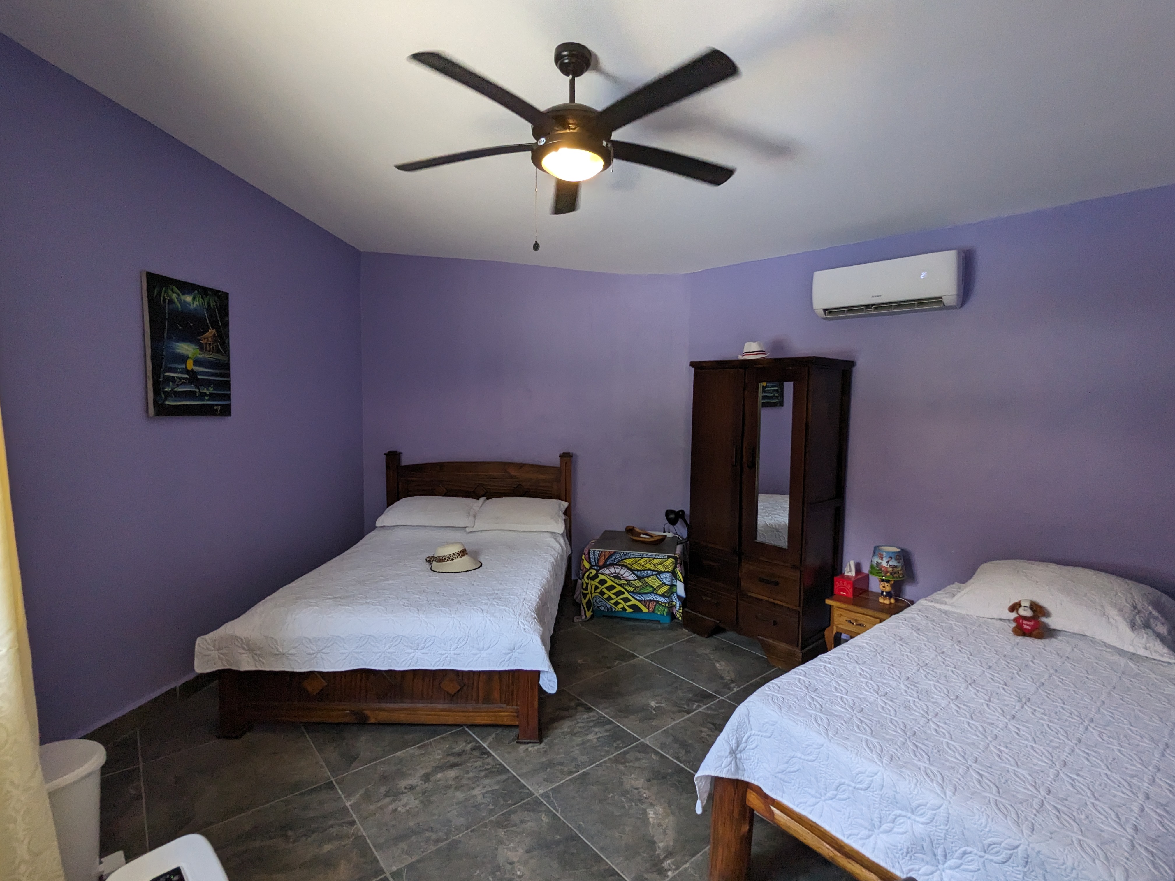 dormitorio de invitados con dos camas paraíso tropical de unidades múltiples samara costa rica